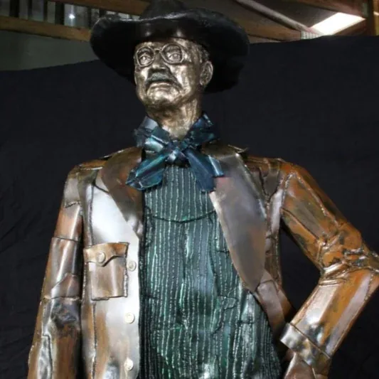 Standing metal figure sculpture