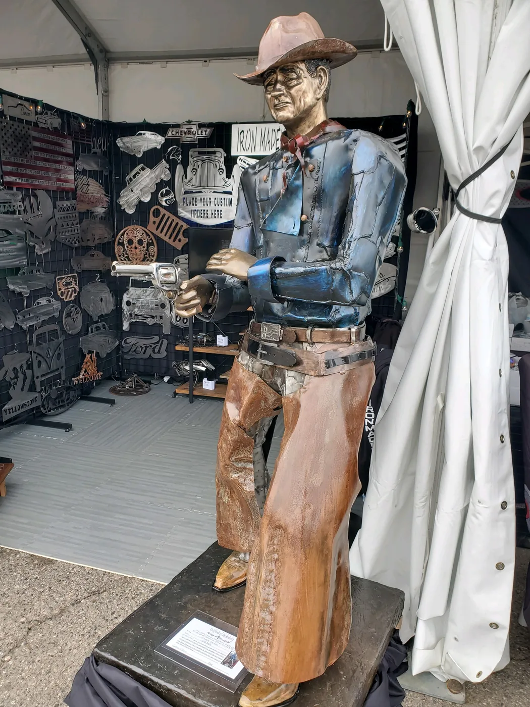 Metal cowboy figure sculpture detail