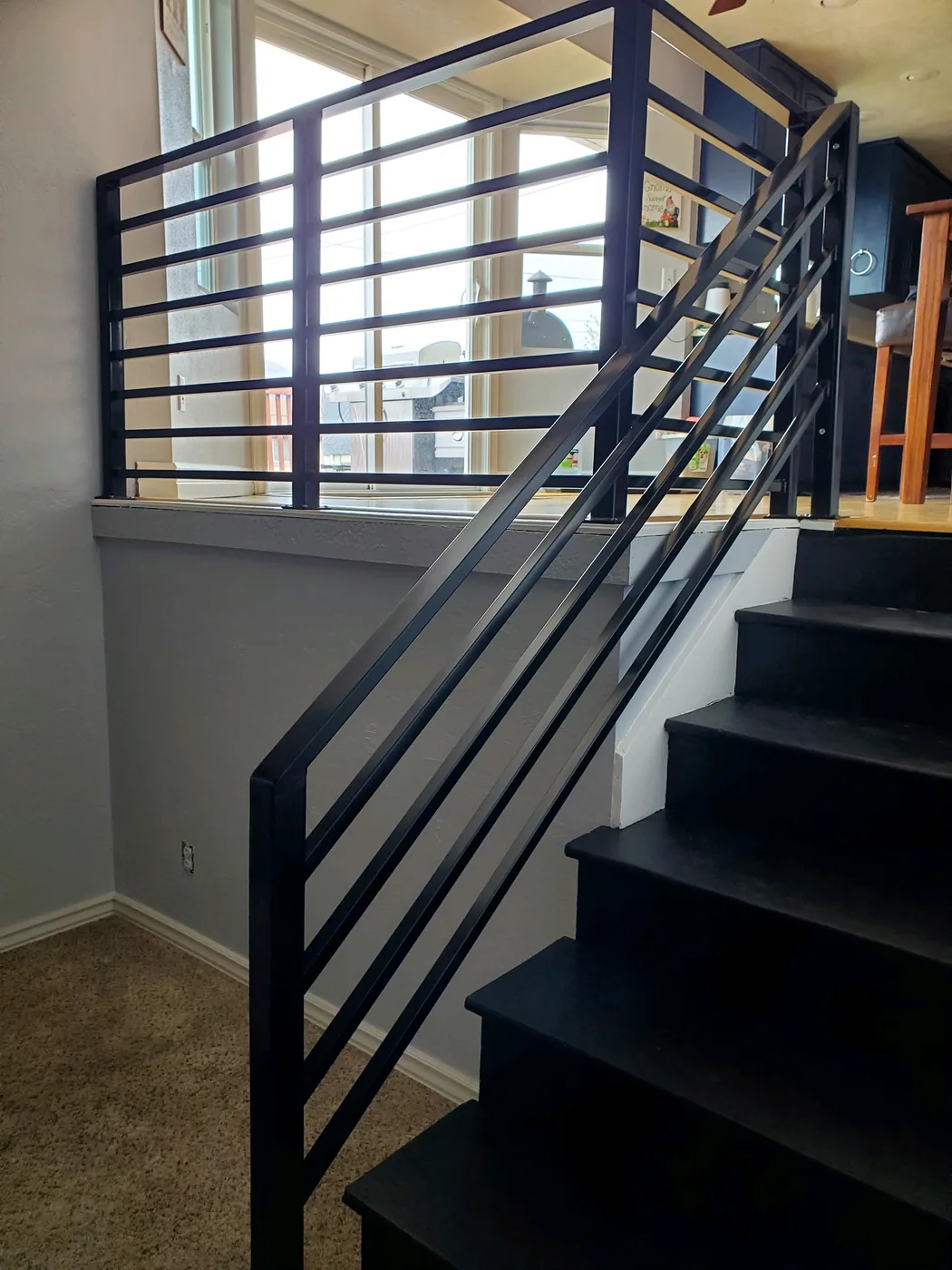 Custom welded metal staircase railing